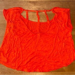 Orange half-open back shirt